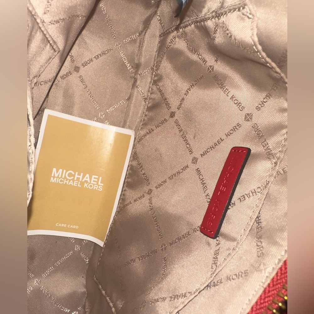 Michael Kors Beige Interior with Red Accent - Picture 3 of 5